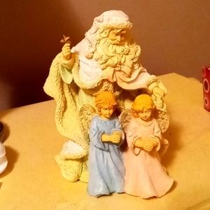 Roman Santa and boy and girl statue